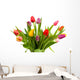 Dutch tulips in glass vase over white background Wall Mural