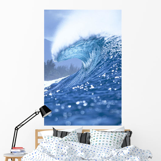 Large Shimmery Blue Wave Curling With Wind Spray, Land Visible Wall Mural