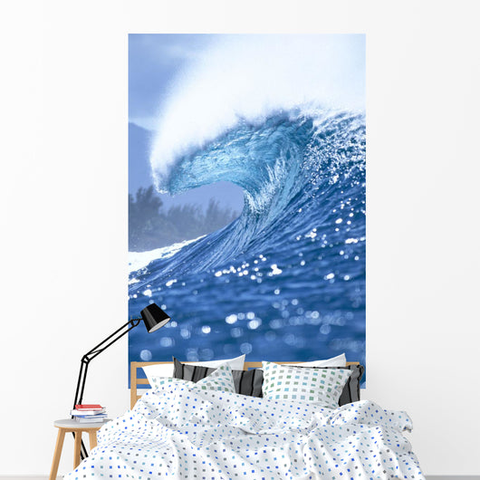 Large Shimmery Blue Wave Curling With Wind Spray, Land Visible Wall Mural