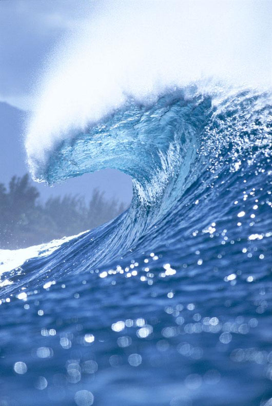 Large Shimmery Blue Wave Curling With Wind Spray, Land Visible Wall Mural