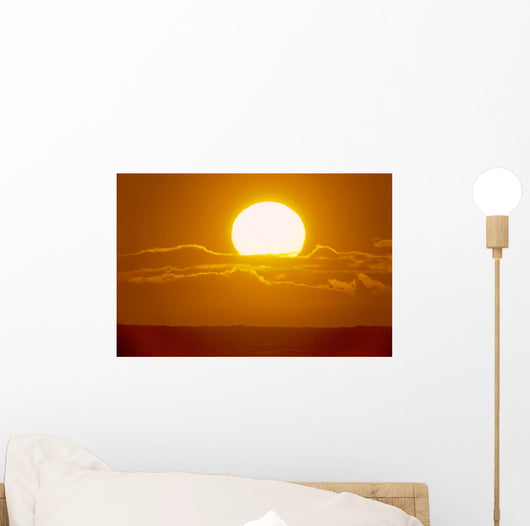 Glowing Sun Ball Partially Covered With Clouds Wall Mural
