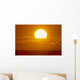 Glowing Sun Ball Partially Covered With Clouds Wall Mural