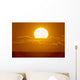 Glowing Sun Ball Partially Covered With Clouds Wall Mural