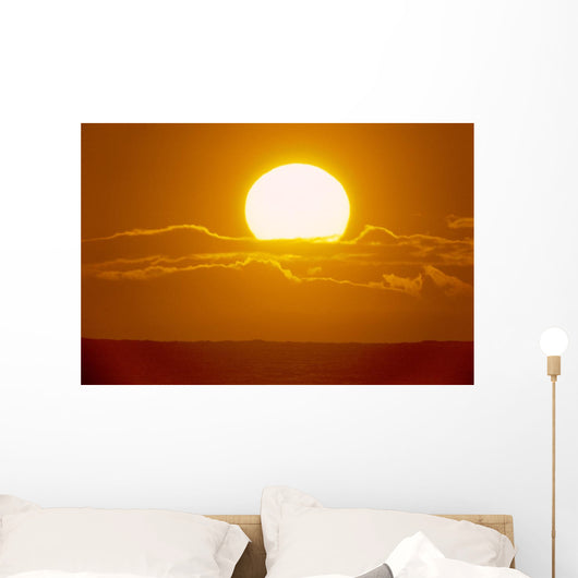 Glowing Sun Ball Partially Covered With Clouds Wall Mural