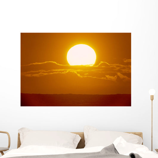 Glowing Sun Ball Partially Covered With Clouds Wall Mural