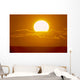Glowing Sun Ball Partially Covered With Clouds Wall Mural
