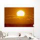 Glowing Sun Ball Partially Covered With Clouds Wall Mural
