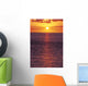 Sunset With Orange Sky Over Ocean Purple Surface With Reflections Wall Mural