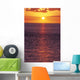 Sunset With Orange Sky Over Ocean Purple Surface With Reflections Wall Mural