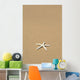 Side View Close-Up Of Single White Starfish On Sandy Beach Wall Mural