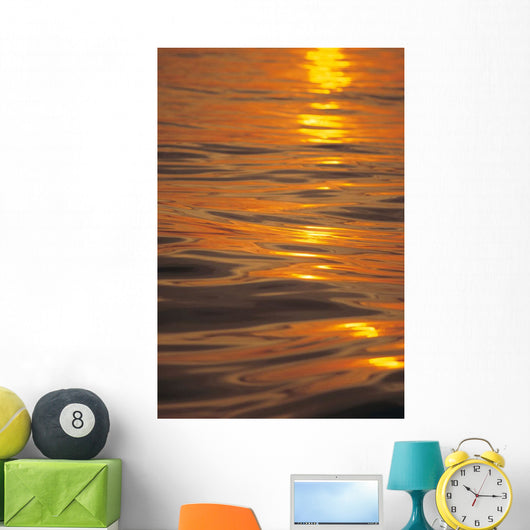 Sunset Orange And Gold Reflections On Smooth Ocean Surface Wall Mural
