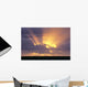 Sunrays Stream Out From Behind Clouds At Sunset, Over Dark Ocean Wall Mural