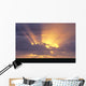 Sunrays Stream Out From Behind Clouds At Sunset, Over Dark Ocean Wall Mural