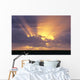 Sunrays Stream Out From Behind Clouds At Sunset, Over Dark Ocean Wall Mural