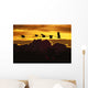 Alaska, Sandhill Crane Flying Above Clouds In Golden Sunset Sky Wall Mural