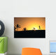 Woman In Distance, Silhouetted Running At Sunset, Palm Trees Wall Mural