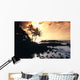 Rocky Shoreline With Palms Silhouetted At Sunset Wall Mural