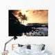 Rocky Shoreline With Palms Silhouetted At Sunset Wall Mural