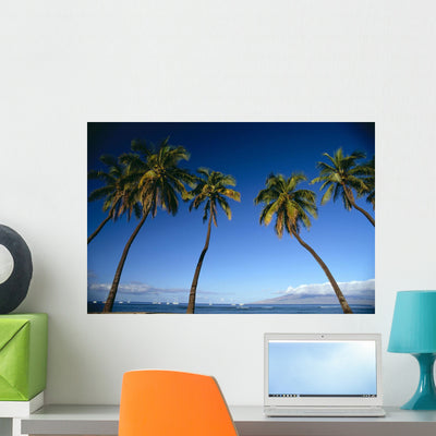 Boats Anchored Ocean Distant Wall Mural shown on a wall