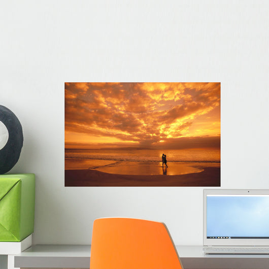 Couple Silhouetted On The Beach During Sunset Wall Mural