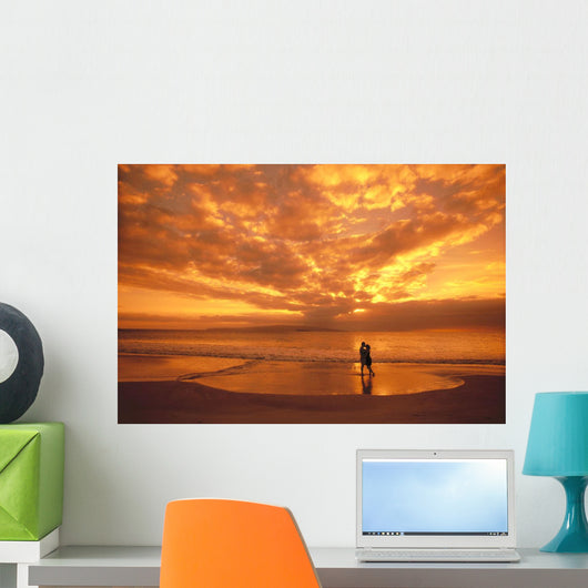 Couple Silhouetted On The Beach During Sunset Wall Mural