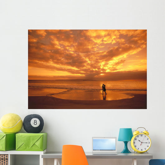 Couple Silhouetted On The Beach During Sunset Wall Mural