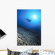 Silhouetted By Sunburst In Blue Ocean Wall Mural