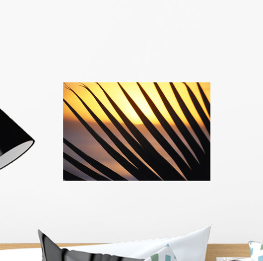 Close-Up Detail Palm Fronds Silhouetted Against Golden Sunset Skies Wall Mural
