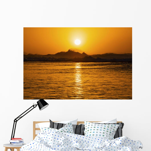 Beautiful Orange Sunset Over Ocean Along Ke'e Beach Wall Mural