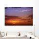 Sun Sinking Below The Horizon Wall Mural