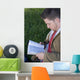Young Man Reading Wall Mural