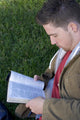 Young Man Reading Wall Mural