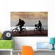 two bikers on beach and sunset Wall Mural