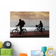 two bikers on beach and sunset Wall Mural