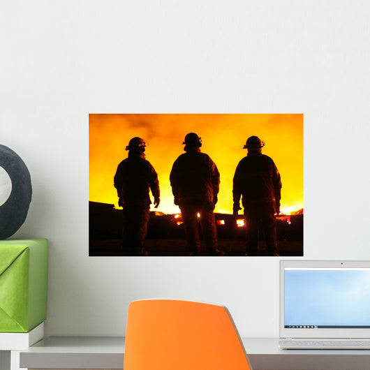 A silhouette of three fire fighters Wall Mural