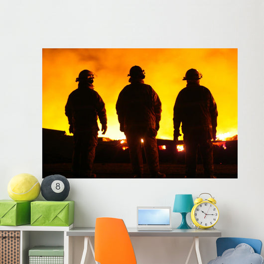 A silhouette of three fire fighters Wall Mural