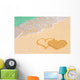 Drawing connected hearts on beach Wall Mural