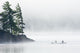 Canoeing Through Fog On Lake Of Two Rivers Wall Mural