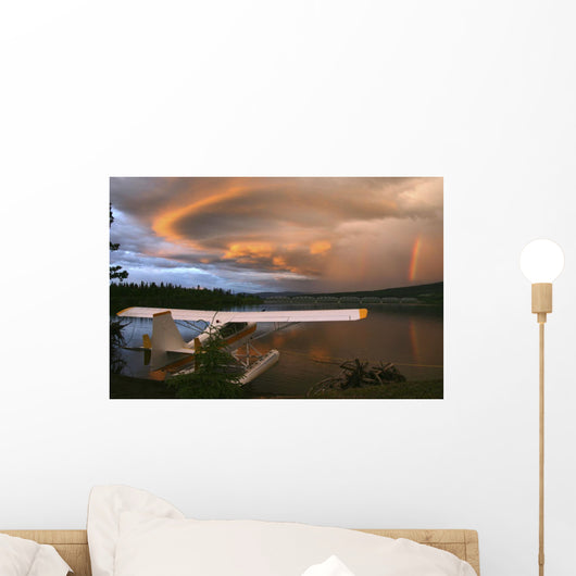 Sunlit Storm Clouds Over A Float Plane With Rainbow And Teslin Bridge Wall Mural