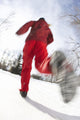 Low Angle View Of A Young Woman Jogging In Winter Wall Mural
