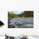 Autumn Colors Over Splashing Maligne River Wall Mural