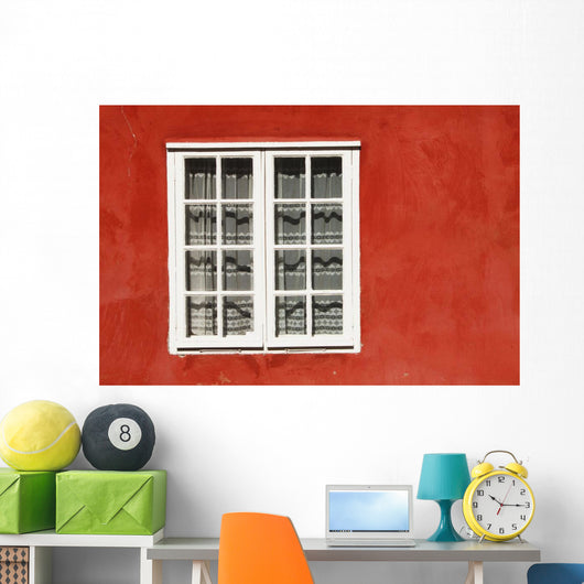 Red Timber House And Window Frame In The Old Town Wall Mural