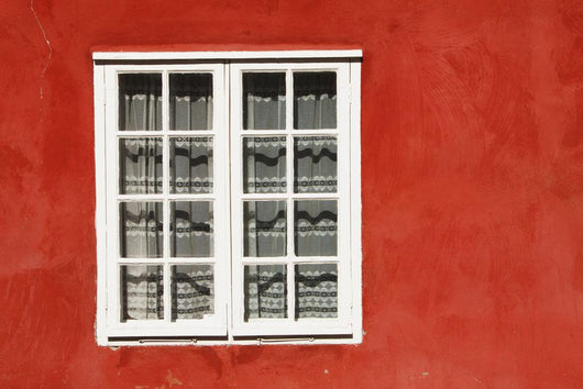 Red Timber House And Window Frame In The Old Town Wall Mural