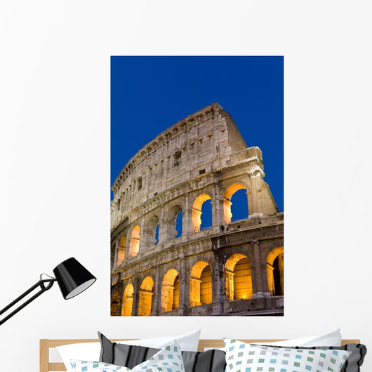 Exterior View Of The Coliseum Amphitheatre At Night, Rome, Italy Wall Mural