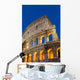 Exterior View Of The Coliseum Amphitheatre At Night, Rome, Italy Wall Mural