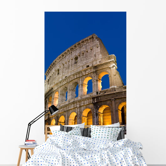 Exterior View Of The Coliseum Amphitheatre At Night, Rome, Italy Wall Mural