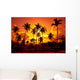 Coconut palms on sand beach in tropic on sunset Wall Mural