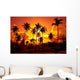 Coconut palms on sand beach in tropic on sunset Wall Mural