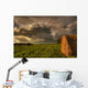 Rolled Hay Bales Under Storm Clouds On A Farm North Of Edmonton Wall Mural
