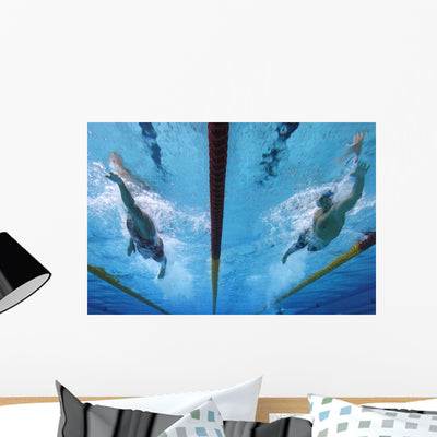 Swimming Action Wall Mural shown on a wall